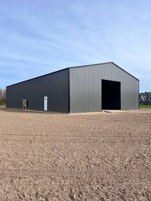 Finished dark metal building