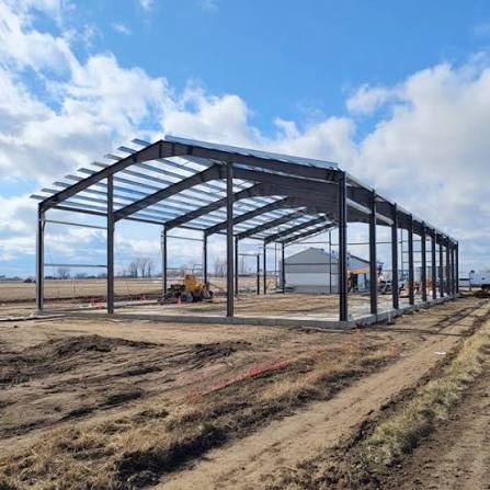 Steel metal building frame under construction